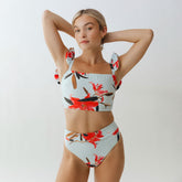 Front view of Sea Glass Almost Cheeky Bottoms showcasing floral print and almost cheeky fit on model against a neutral background