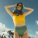 Front view of Moss Diamond Almost Cheeky Bottoms showcasing the green diamond pattern and cheeky fit on a model outdoors